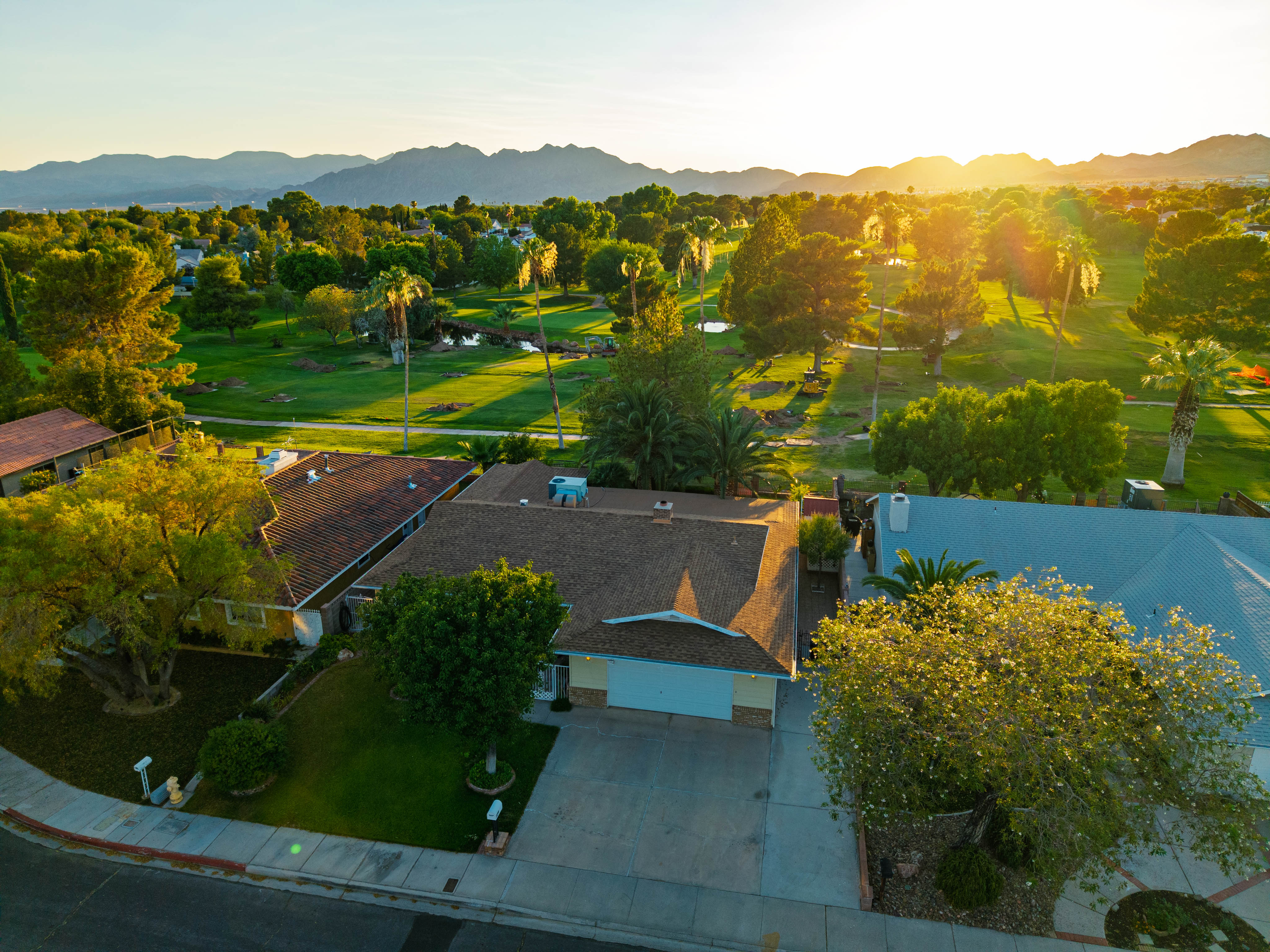 Golden hour aerial photo over Las Vegas golf course homes