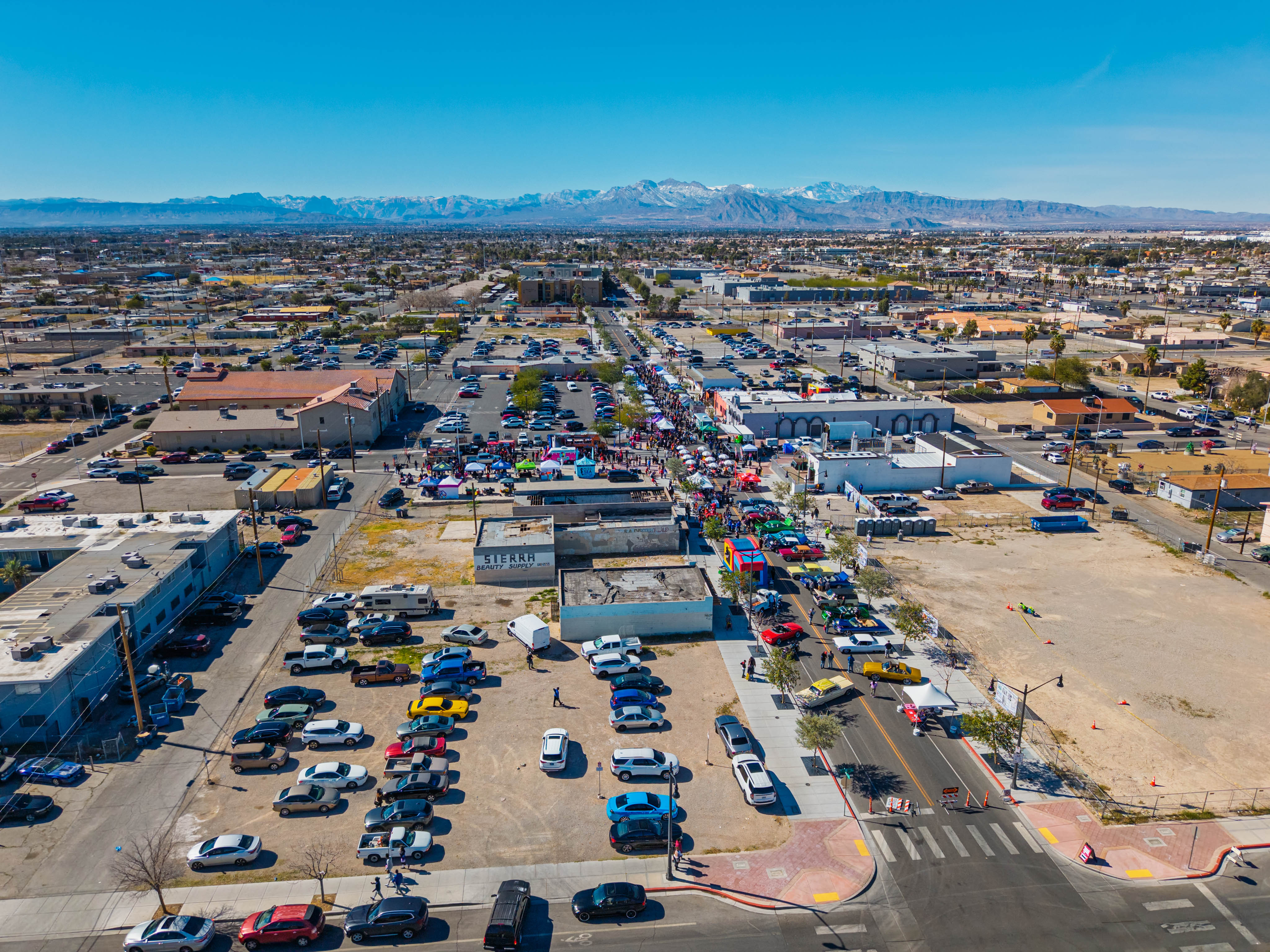 Aerial photo of a downtown Las Vegas outdoor market with mountains in the distance